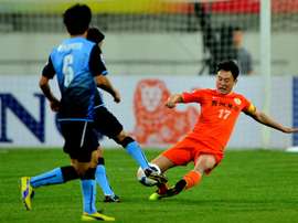 Former City midfielder Sun Jihai retired from international football. AFP