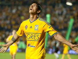 Tigres Alan Pulido celebrates after scoring against Atlas during their 2014 Mexican Clausura tournament football match in Monterrey, Mexico, on April 26,2014