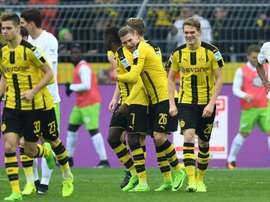 Les joueurs du Borussia Dortmund célèbrent un but contre Wolfsburg en Bundesliga. AFP