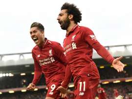 Liverpool will miss Salah and Firmino tonight. AFP/Archivo