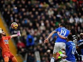 Leonardo Bonucci heads to score during the match Udinese vs Juventus. AFP