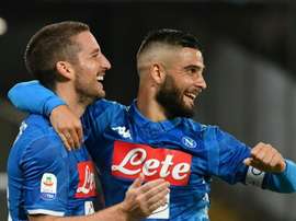 Mertens (left) scored a hat-trick for Napoli. AFP