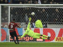 Lille's Yassine Benzia scoring against his former team. AFP