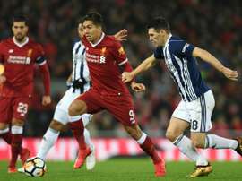Firmino falhou o empate aos 26', desperdiçando um pênalti. AFP