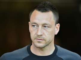 John Terry com pé partido. AFP