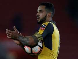 Walcott in FA Cup action for Arsenal. AFP