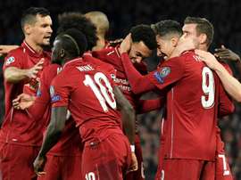 Melhor jogador e treinador do mês de março para o Liverpool. AFP
