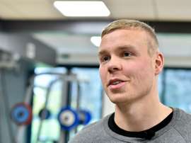 Icelands forward Kolbeinn Sigthorsson speaks with a journalist during a training session at FC Nantess football club training centre in La Chapelle-sur-Erdre, western France, on December 8, 2015