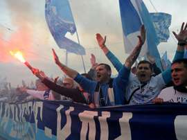 FC Zenit St.Petersburg fans celebrate prior to the football match between FC Zenit and FC Ufa in St.Petersburg on May 17, 2015