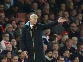 Arsenals French manager Arsene Wenger reacts on the touchline during the UEFA Champions League Group F football match between Arsenal and Olympiakos at The Emirates Stadium in north London on September 29, 2015