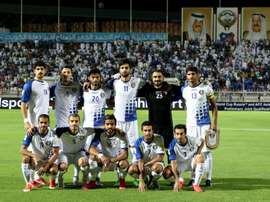 Kuwaits starting eleven pose for a group picture prior to their AFC qualifying football match for the 2018 FIFA World Cup between Kuwait and Lebanon on October 13, 2015 at the Kuwait Sports Club Stadium in Kuwait City
