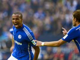 Schalkes defender Joel Matip celebrates after scoring during a German first division Bundesliga football match against Mainz, in Gelsenkirchen, on September 13, 2015