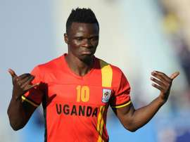 Uganda's Luwagga Kizito celebrates after scoring a goal during their CAF qualifyer. AFP