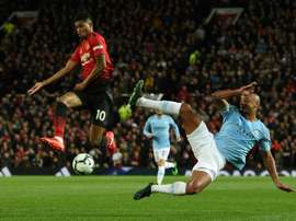 Marcus Rashford urges United to play like a team. AFP
