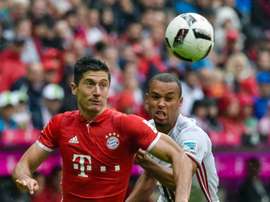Bayern Munich striker Robert Lewandowski (front) in action against FC Ingolstadt in southern Germany, on September 17, 2016