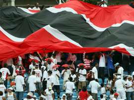 Trinidad insist US game on despite water-logged pitch. AFP