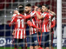 Atletico Madrid players celebrate one of their goals in a win over Valencia in La Liga. AFP