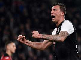 Mario Mandzukic is still hungry for success at AC Milan. AFP