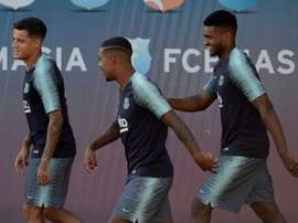 Marlon (d) está ahora más cerca de la Bundesliga. AFP