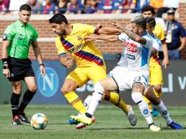 Suarez's brace, Griezmann goal power Barca over Napoli