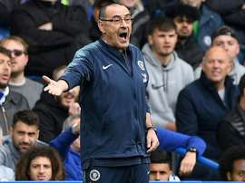 Maurizio Sarri is likely to keep his job with top 4 finish for Chelsea. AFP