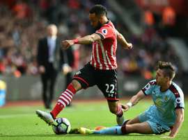 Hughes has called on Southampton fans to go easy on Redmond. AFP