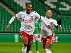 Lyon crush Saint-Etienne to stay in touch at the top. AFP