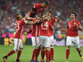 Bayern Munich celebrate after scoring against Werder Bremen. AFP