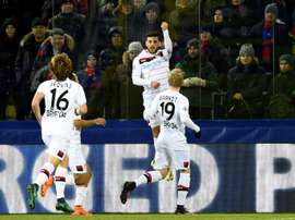 Leverkusen players celebrate opening the scoring. AFP
