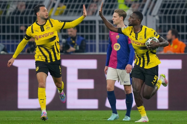 Guirassy hat-trick not enough as Barca advance to Champions League semi-finals