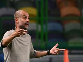 Guardiola lamenta a lesão de Van Dijk. AFP