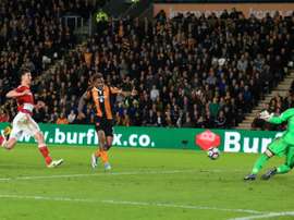 Hull Citys striker Abel Hernandez (C) scores
