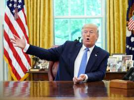 Donald Trump demande le report des JO. AFP