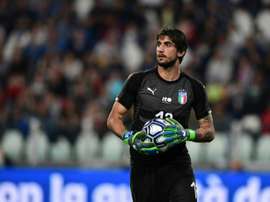 Juve goalkeeper Perin, Behrami return to Genoa. AFP