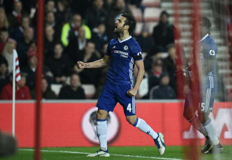 Chelseas Spanish midfielder Cesc Fabregas celebrates scoring his teams first goal against Sunderland on December 14, 2016