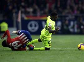Ligue 1 and the Premier League could be Umtiti's (R) next destinations. AFP