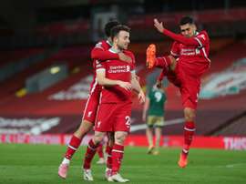 Liverpools Diogo Jota (C) celebrates scoring against Sheffield United. AFP
