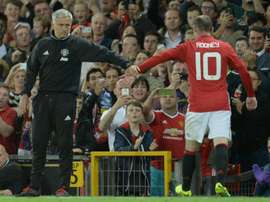 Manchester Uniteds Jose Mourinho (left) acknowledges Wayne Rooney as the striker is substituted during a friendly testimonial against Everton at Old Trafford on August 3, 2016