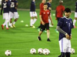 Iran goalkeeper Alireza Berianvand's penalty save was the catalyst for a 2-0 victory over Oman. AFP