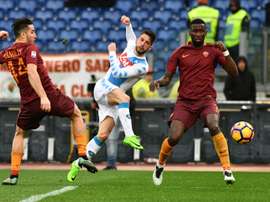 Mertens at the double as Napoli conquer Roma. AFP