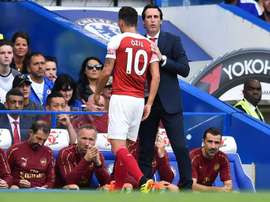 Mesut Ozil Arsenal. AFP