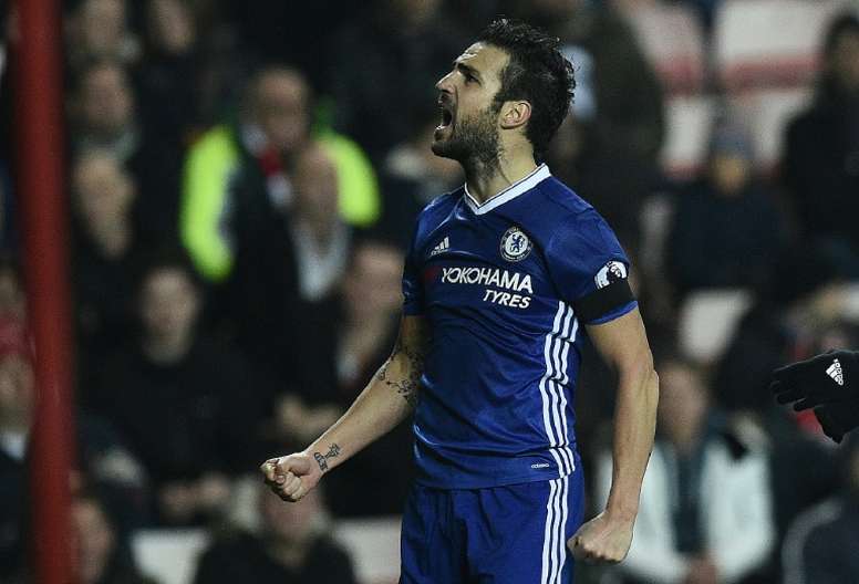 Chelseas Spanish midfielder Cesc Fabregas celebrates scoring during their match against Sunderland on December 14, 2016