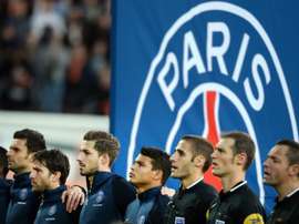 Paris Saint-Germains players sing La Marseillaise before their away game against Lorient on November 21, 2015