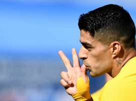 Barca up to second after tough Getafe win. AFP
