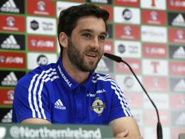 Striker Will Grigg has become a cult hero with Northern Ireland fans. AFP