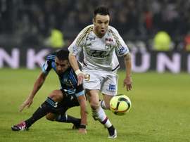 Mathieu Valbuena (upright) plays for Lyon against Marseille on January 24, 2016, at the Parc Olympique Lyonnais stadium in Decines-Charpieu, France