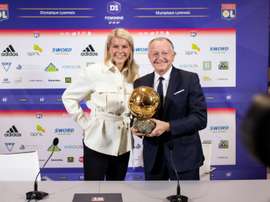 ean-Michel Aulas pose avec l'attaquante de l'OL Ada Hegerberg. AFP