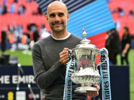 Guardiola com os grandes. AFP