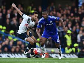 John Mikel Obi vying with Tottenham's Moussa Dembele. AFP