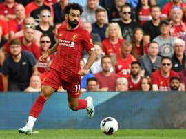 Salah came in fourth place with 26 points. AFP